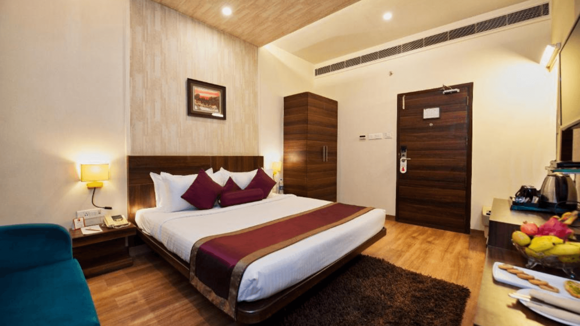 Luxury room at Sapna Clarks Inn Lucknow featuring spacious layout and upgraded room décor