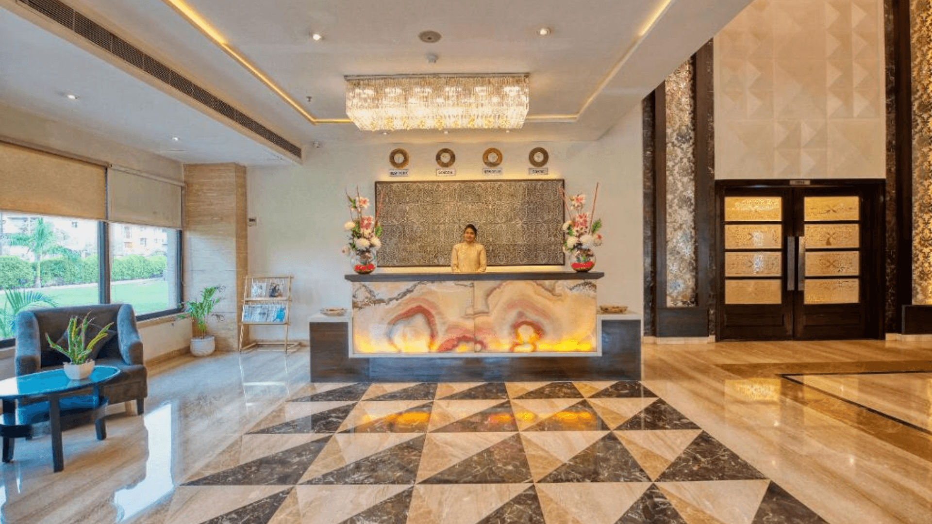 Entrance of Sapna Clarks Inn Lucknow displaying hotel façade and driveway access