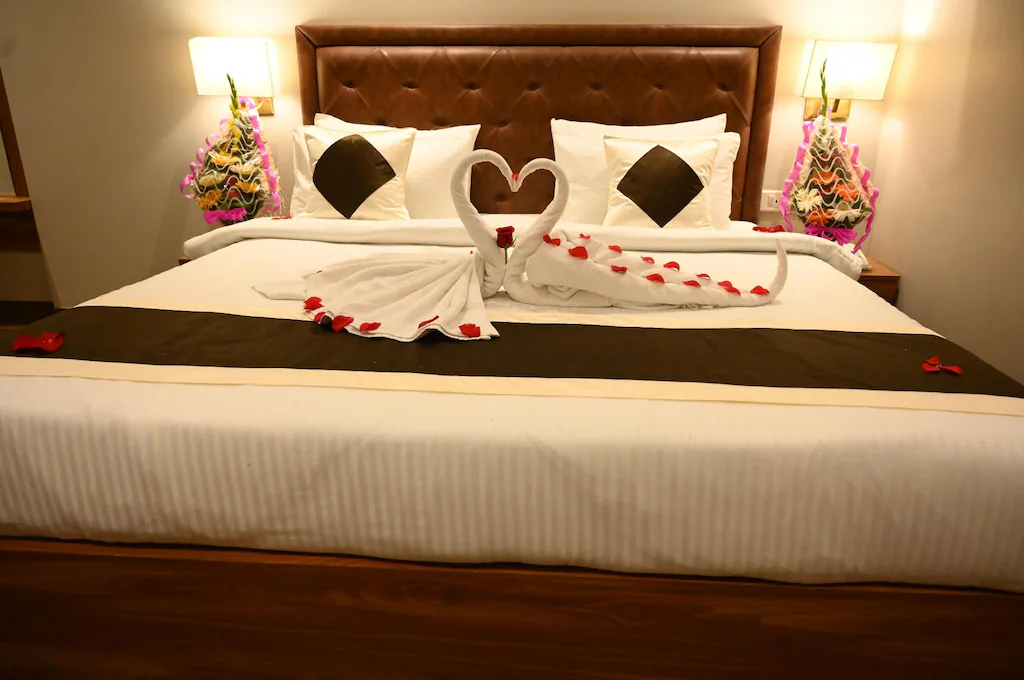Executive room at Neel Clarks Inn Express Agra featuring enhanced furnishings, bedding, and refined interior design