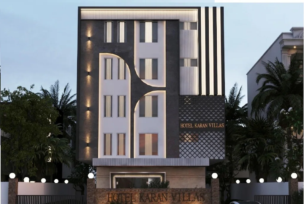 Entrance view of Hotel Karan Vilas Agra with exterior signage and front access area