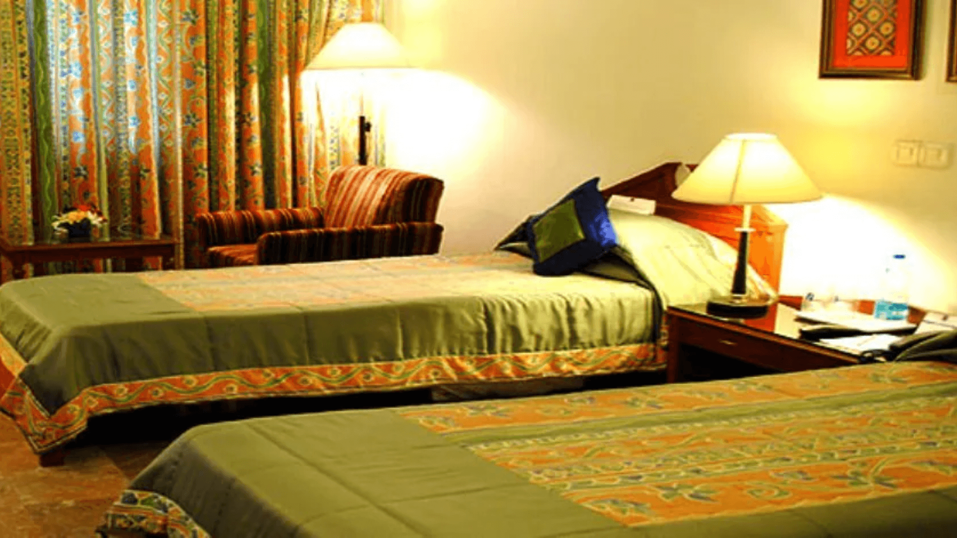 Standard room at Empires Hotel, Paradeep with modern interiors and comfortable bedding
