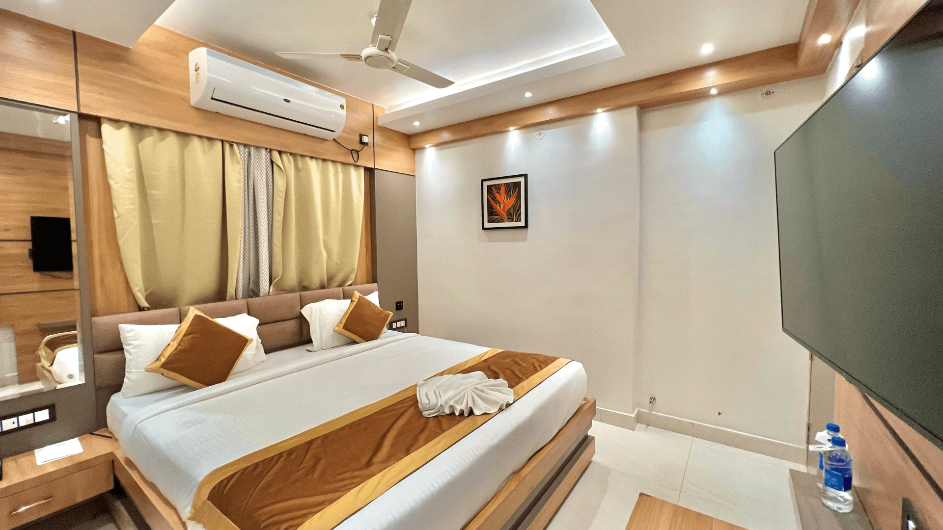 Executive room at The Magnum Deoghar with workspace and bed visible