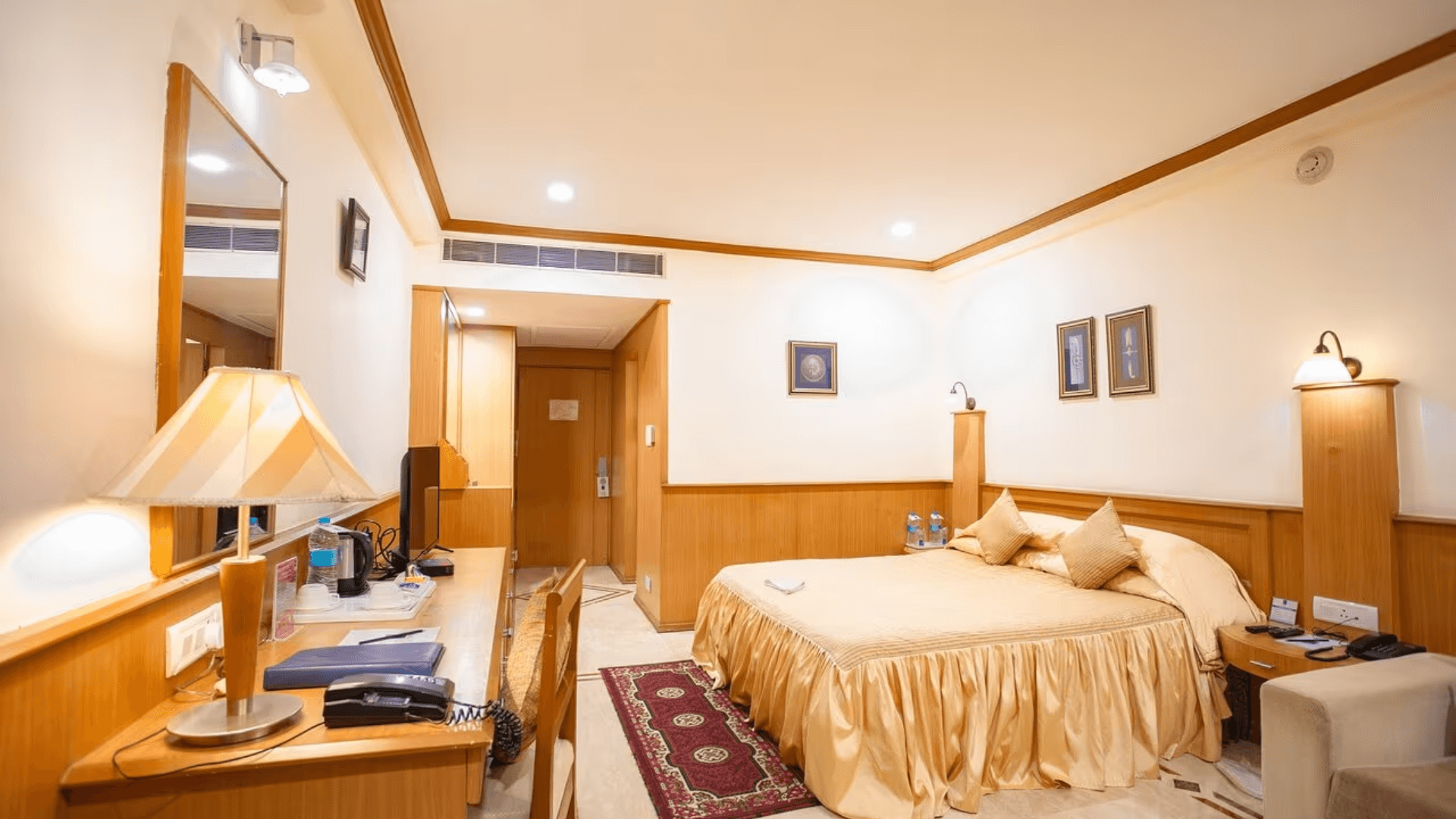 Club room at Empires Hotel, Paradeep featuring spacious layout and work desk