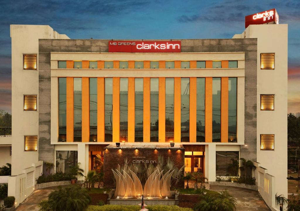 Entrance view of MB Greens Clarks Inn Moradabad showing exterior façade and access driveway