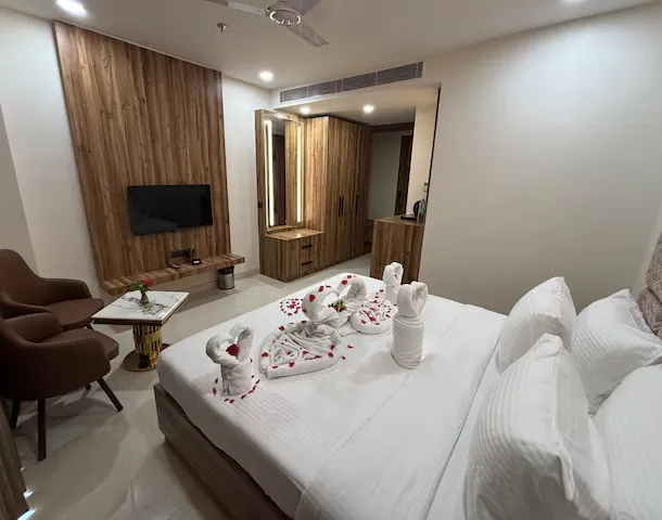 Premium room at Anandi Bhawan by Paandora Vrindavan with spacious layout and seating area