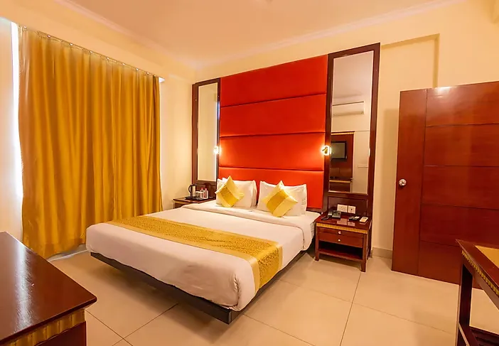 Suite room at Crestmont Ashapurna Jaipur featuring extended space and seating arrangement
