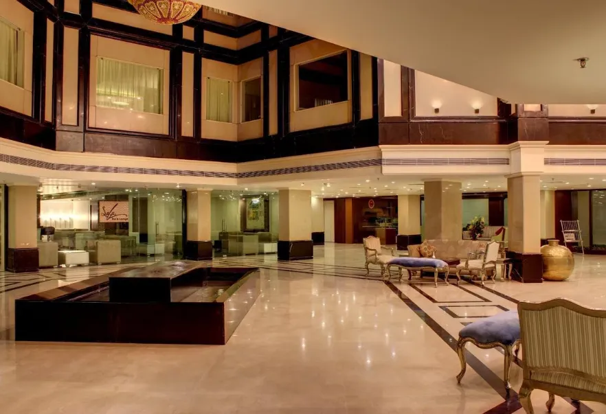 Hotel entrance of Golden Tulip Jaipur displaying exterior façade and driveway access