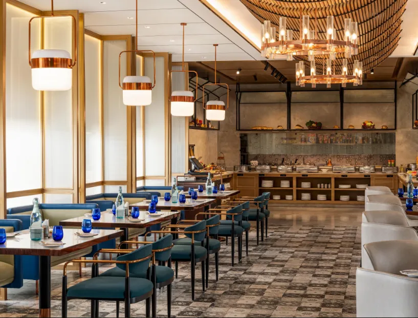 Restaurant at Ramada Encore by Wyndham Bareilly Civil Lines with organized dining tables and clean, modern interior setup