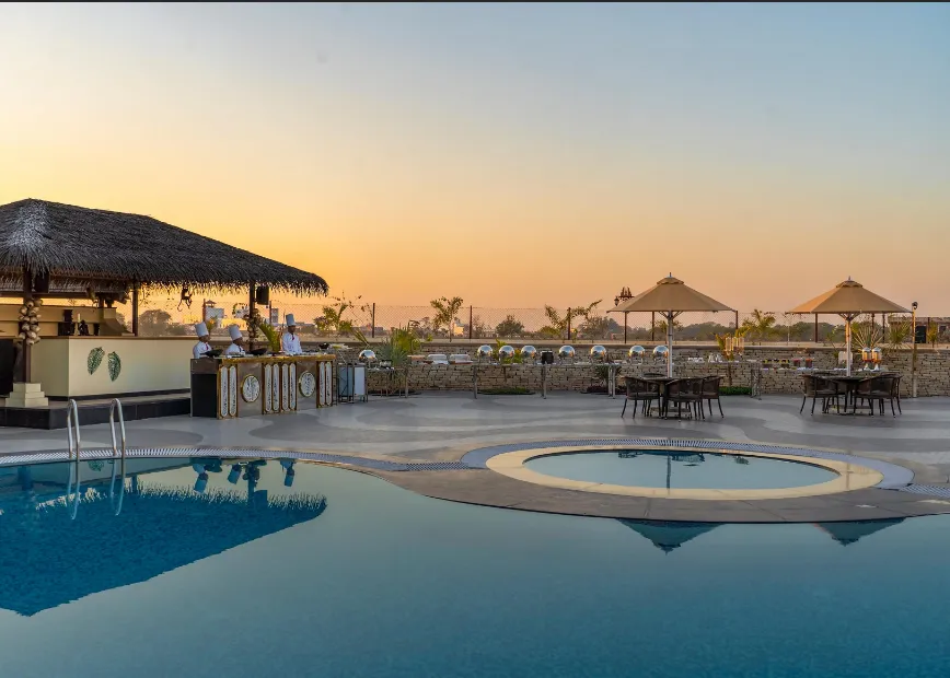 Swimming pool at Shyama Sarovar Portico Orai with visible pool area and surrounding deck