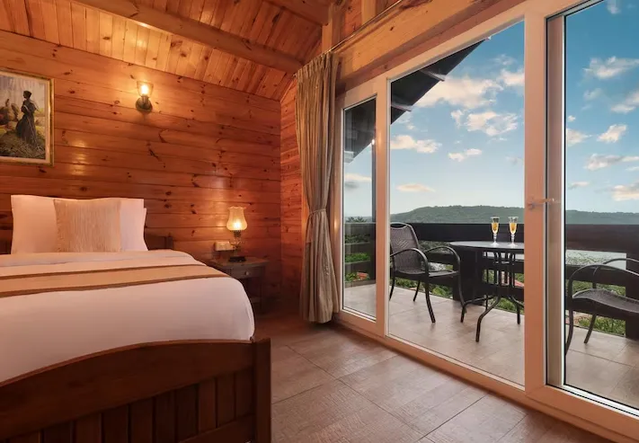 Highland-Sarovar-Portico-Sindhudurg-deluxe-room-kingbed-gardenview