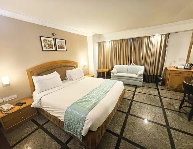 Utthama-Hotel-Nellore-superior-club-room.webp